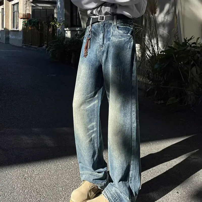 Vintage washed denim jeans for men in autumn