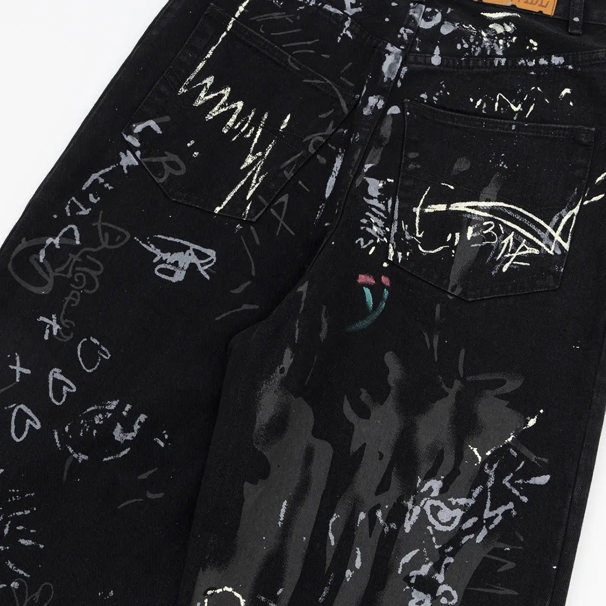 Graffiti washed denim jeans for men and women Markonline