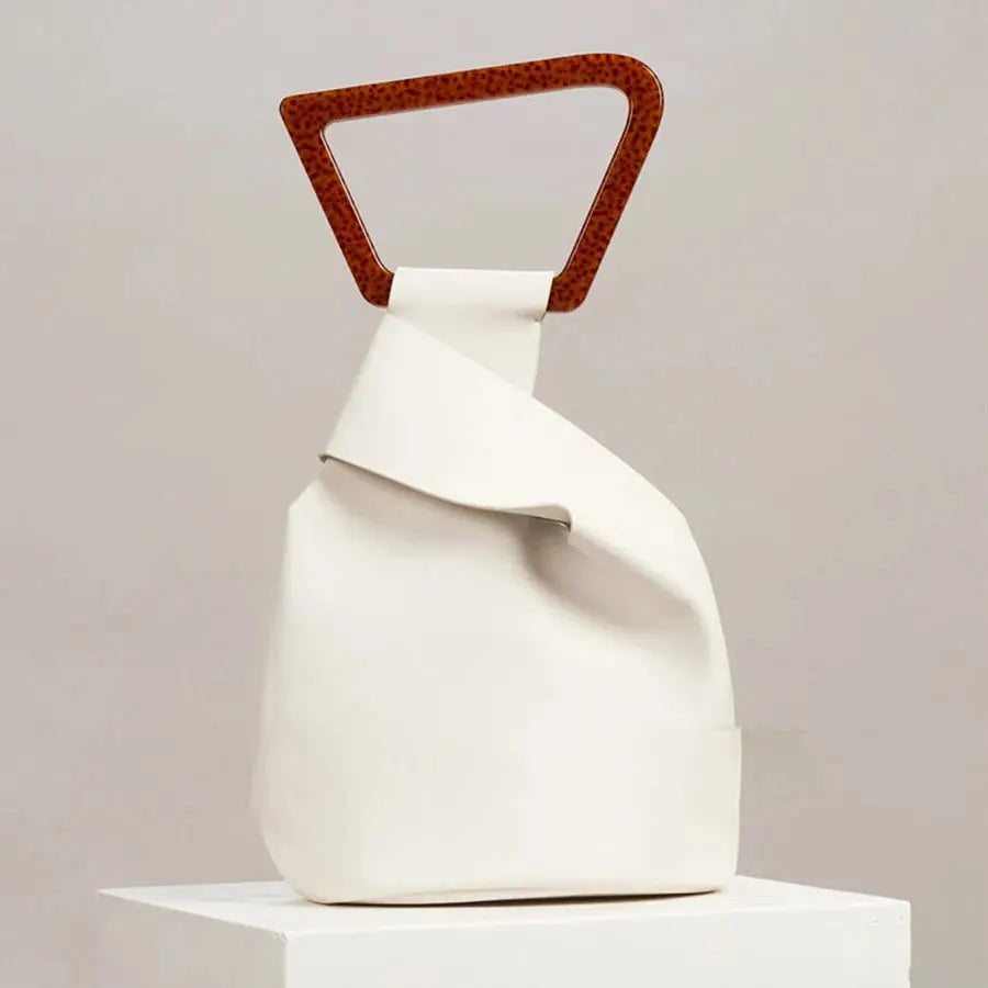 Simple irregular design clutch bag summer new pu leather bucket bag female fashion personality acrylic handle handbag solid tote